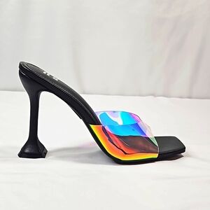 it's Iridescent black slip on heels Size 8